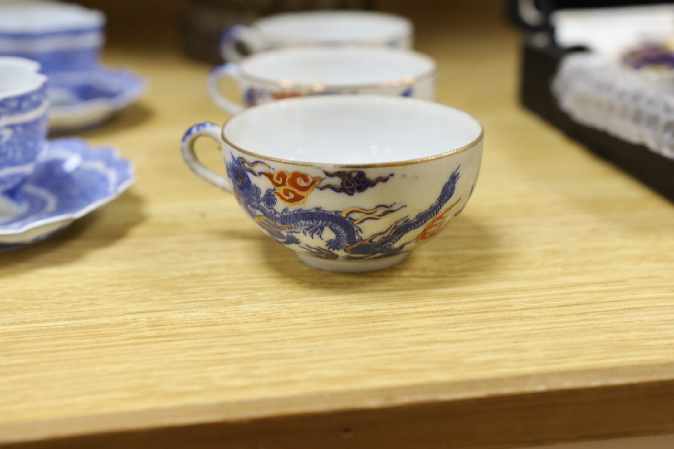 A group of Japanese ceramics, Meiji period and a bronze figure of Buddha